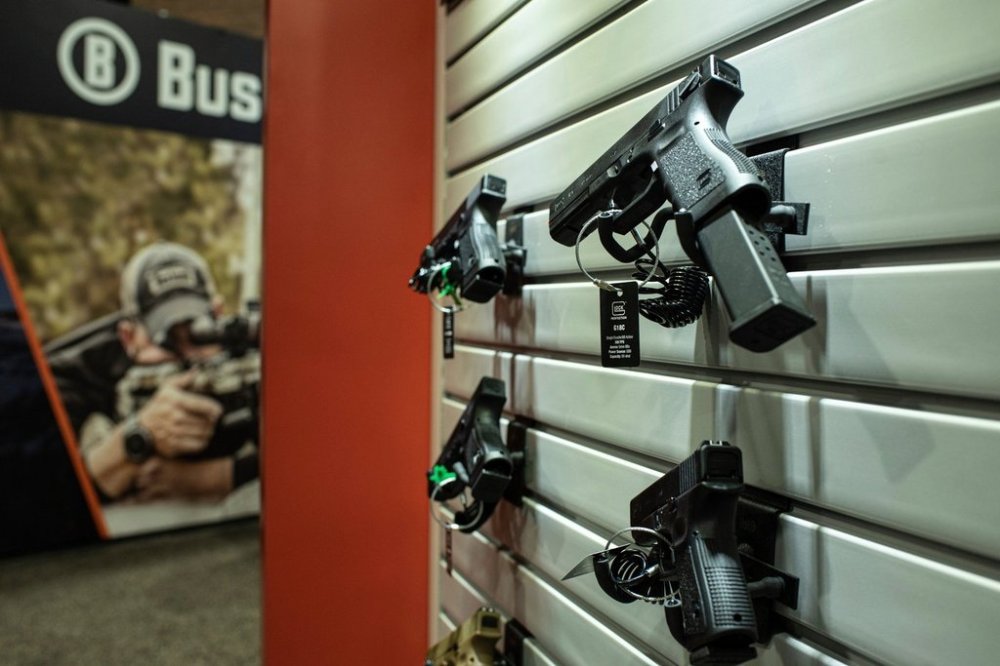 FILE - This photo taken Wednesday, Jan. 22 2020, shows firearms on display at SHOT Show, the annual trade show sponsored by the National Shooting Sports Foundation, in Las Vegas. (AP Photo/Lisa Marie Pane, file)
