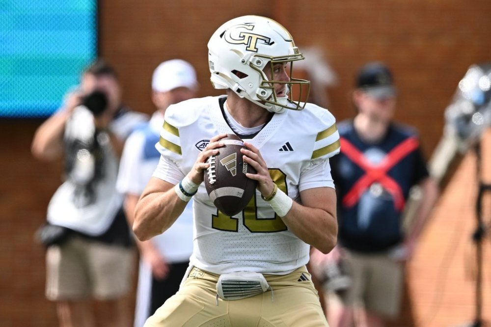 Georgia Tech quarterback Haynes King (10) drops back to pass during the first half of an NCAA college football game against Wake Forest, Saturday, Sept. 27, 2025, in Winston-Salem, N.C. (AP Photo/Matt Kelley)