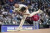 Milwaukee Brewers' Quinn Priester throws during the first inning of a baseball game against the Los Angeles Angels Thursday, Sept. 18, 2025, in Milwaukee. (AP Photo/Morry Gash)