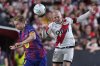 Barcelona's Frenkie de Jong, left, and Rayo's Isi Palazon battle for the ball during the Spanish La Liga soccer match between Rayo Vallecano and FC Barcelona at the Vallecas stadium in Madrid, Spain, Sunday, Aug. 31, 2025. (AP Photo/Manu Fernandez)