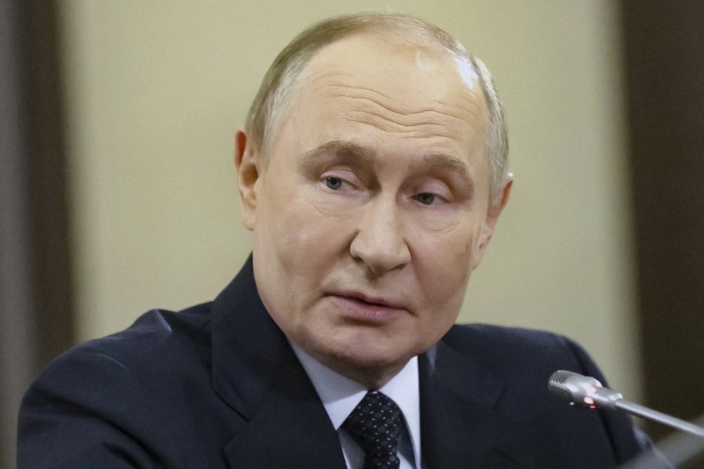 Russian President Vladimir Putin attends a meeting with leaders of the political parties represented in the State Duma, the Russian Lower House of the Parliament, at the Novo-Ogaryovo state residence, outside Moscow, Russia, on Thursday, Sept. 18, 2025. (Mikhail Sinitsyn, Sputnik, Kremlin Pool Photo via AP)