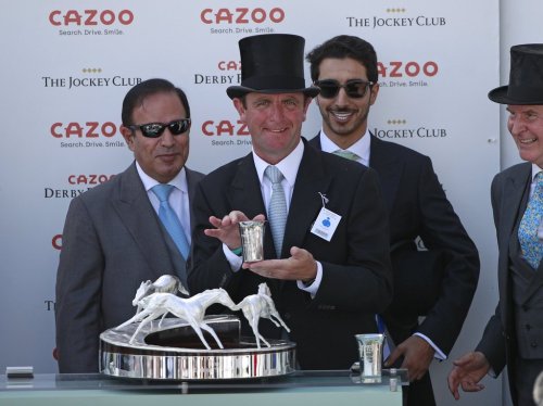 Trainer Charlie Appleby holds his trophy after his horse Adayar won the Epsom Derby during the Derby horse race meeting at Epsom racecourse, near London, England, Saturday, June 5, 2021. THE CANADIAN PRESS/AP-Ian Walton