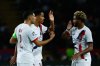 PSG's Senny Mayulu, center, celebrates with teammates after scoring his side's opening goal during the Champions League opening phase soccer match between Barcelona and Paris Saint-Germain at the Lluis Companys Olympic Stadium in Barcelona, Spain, Wednesday, Oct. 1, 2025. (AP Photo/Joan Monfort)