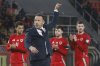 Wales' head coach Craig Bellamy celebrates at the end of a World Cup 2026 Group J qualifying soccer match between North Macedonia and Wales at National Arena Todor Proeski in Skopje, North Macedonia, Tuesday, March 25, 2025. (AP Photo/Boris Grdanoski)