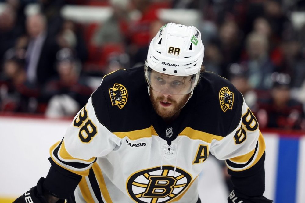 FILE - Boston Bruins' David Pastrnak (88) watches during the first period of an NHL hockey game against the Carolina Hurricanes in Raleigh, N.C., Thursday, March 6, 2025. (AP Photo/Karl DeBlaker, File)