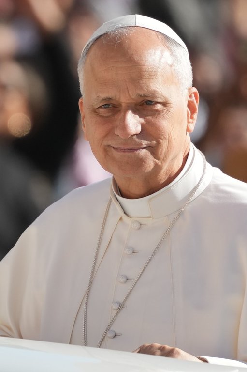 Pope Leo XIV arrives to hold an audience with the participants of the Jubilee of Missionaries and Migrants, at the Vatican, Saturday, Oct. 4, 2025. (AP Photo/Andrew Medichini)