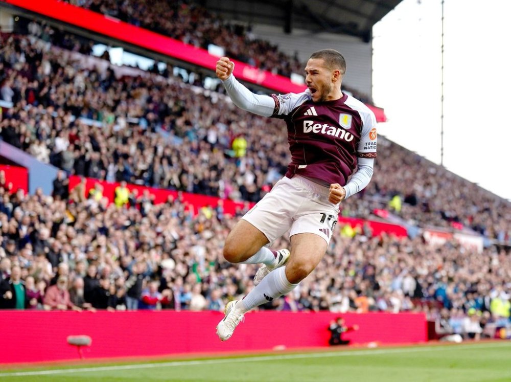 Aston Villa's Emi Buendia celebrates scoring his team's third goal during the English Premier League soccer match between Aston Villa and Fulham at Villa Park, Birmingham, England, Sunday, Sept. 28, 2025. (Jacob King/PA via AP)