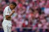 Real Madrid's Kylian Mbappe looks down during the Spanish La Liga soccer match between Atletico Madrid and Real Madrid at Metropolitano stadium, in Madrid, Spain, Saturday, Sept. 27, 2025. (AP Photo/Manu Fernandez)