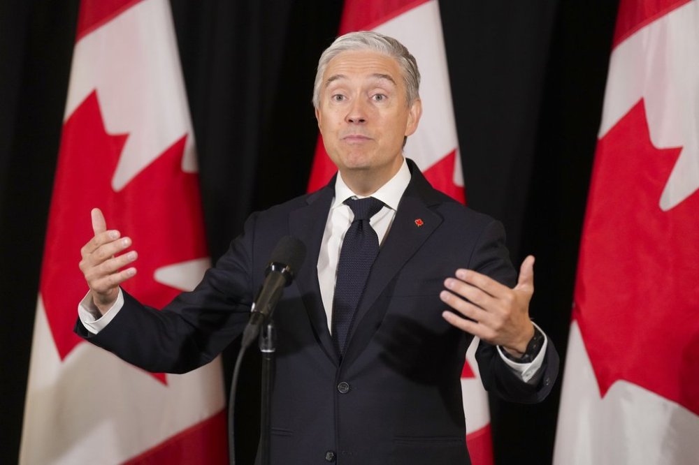 Minister of Finance and National Revenue Francois Philippe Champagne speaks to the media, at the Liberal cabinet retreat, in Toronto, on Thursday, Sept. 4, 2025. THE CANADIAN PRESS/Chris Young