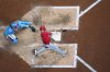 Cincinnati Reds' Gavin Lux hits a double during the sixth inning of a baseball game against the Milwaukee Brewers Friday, Sept. 26, 2025, in Milwaukee. (AP Photo/Morry Gash)