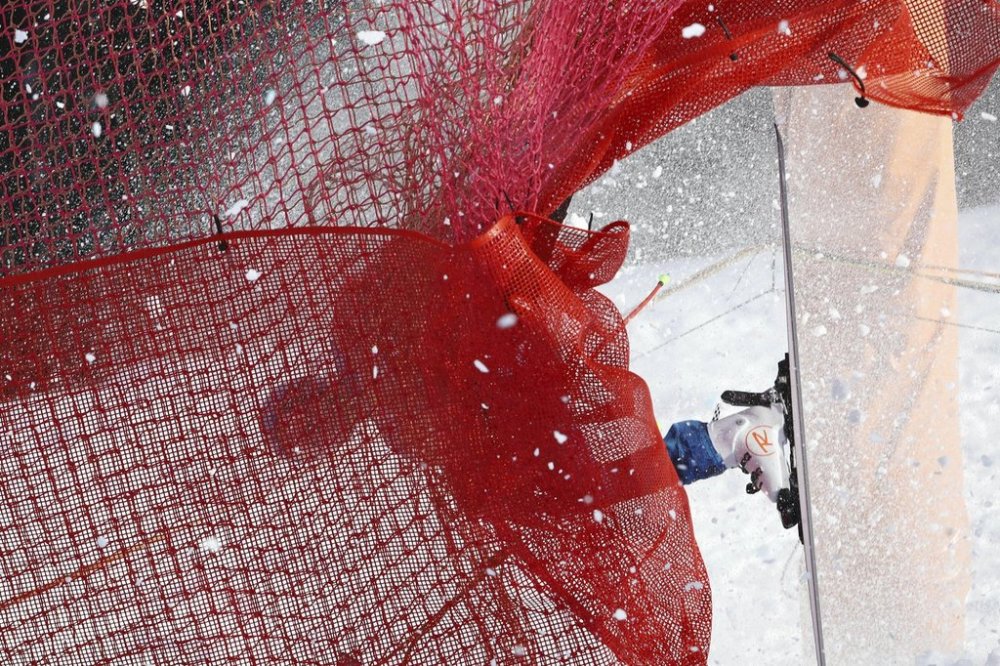 FILE - United States' Ryan Cochran Siegle crashes onto the safety net during an alpine ski, men's World Cup downhill in Kitzbühel, Austria, Friday, Jan. 22, 2021. (AP Photo/Marco Trovati, File)
