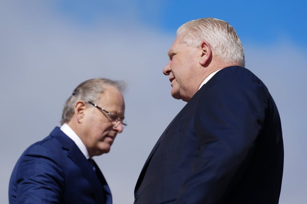 Ontario Premier Doug Ford and Solicitor General Michael Kerzner attend an event in Mississauga, Ont., on Wednesday, April 30, 2025. THE CANADIAN PRESS/Chris Young