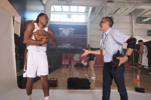 New Orleans Pelicans forward Christian Shumate poses for New Orleans Times Picayune newspaper photographer Chris Granger, during the team's NBA basketball media day in Metairie, La., Tuesday, Sept. 23, 2025. (AP Photo/Gerald Herbert)