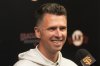 San Francisco Giants president of baseball operations Buster Posey smiles while speaking at a news conference in San Francisco, Wednesday, Oct. 1, 2025. (AP Photo/Jeff Chiu)