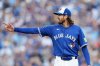 Toronto Blue Jays pitcher Kevin Gausman (34) reacts to a pop fly out during the fifth inning of game 1 in MLB American League Division Series baseball action against the New York Yankees in Toronto on Saturday, Oct. 4, 2025. THE CANADIAN PRESS/Nathan Denette