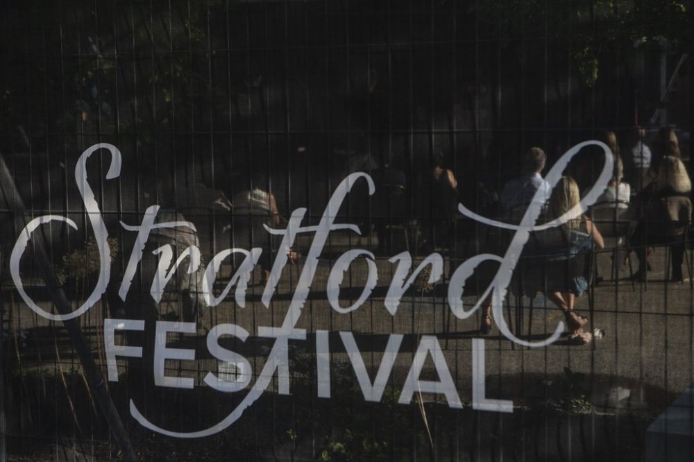 Audience members are seen through a screen on the Stratford Festival's opening night of their theatre season in Stratford, Ont. on Tuesday, July 13, 2021. THE CANADIAN PRESS/Chris Young