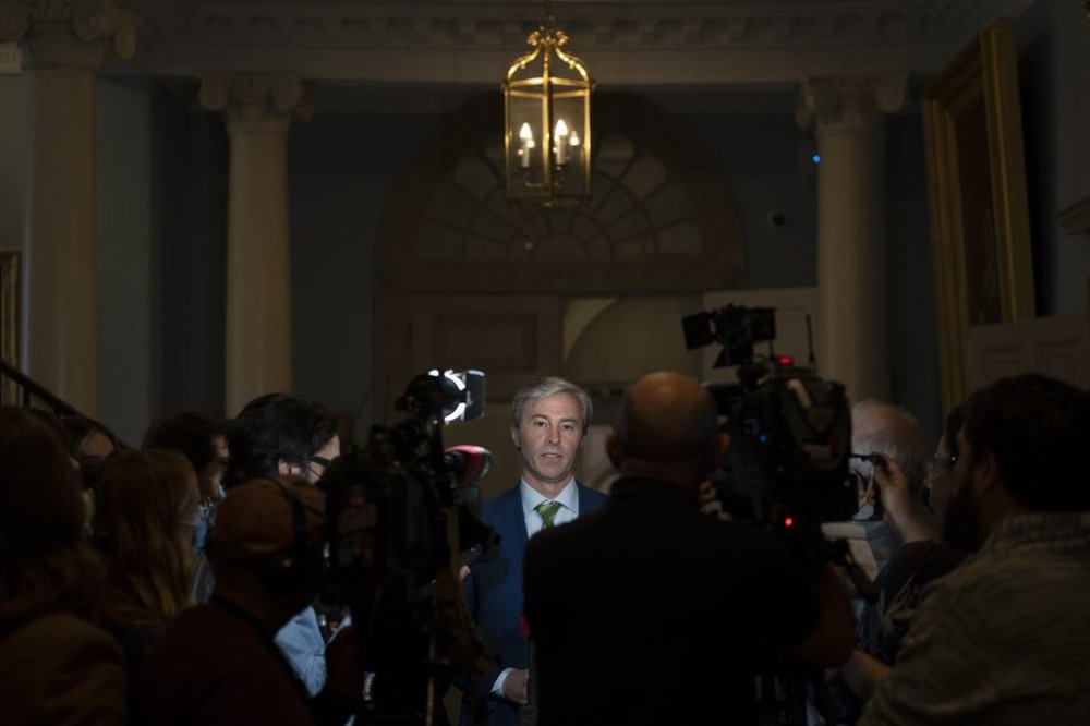 Nova Scotia Premier Tim Houston speaks to reporters following the tabling of the provincial budget at the Nova Scotia legislature in Halifax on Thursday, March 23, 2023. THE CANADIAN PRESS/Darren Calabrese