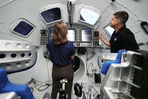Jenni Gibbons, left, and mission specialist Jeremy Hansen, both Canadian Space Agency astronauts, work in the Orion mission simulator at Johnson Space Center on Friday, July 25, 2025, in Houston, ahead of the Artemis II mission. THE CANADIAN PRESS/AP-Ashley Landis