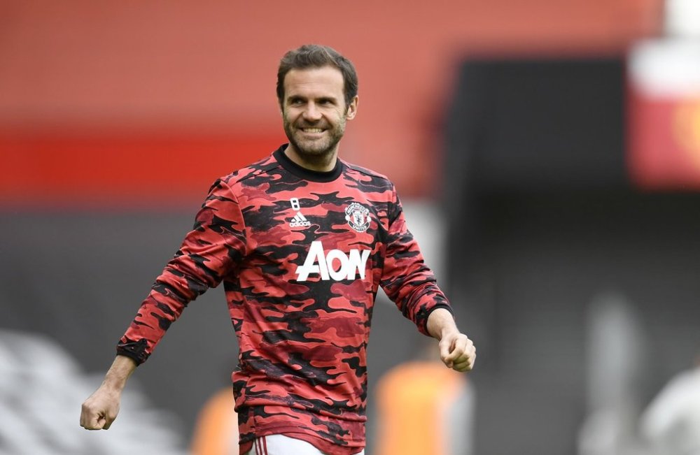 FILE - Manchester United's Juan Mata looks on during warm up before the English Premier League soccer match between Manchester United and Leicester City, at the Old Trafford stadium in Manchester, England, Tuesday, May 11, 2021. (Peter Powell/Pool via AP, File)
