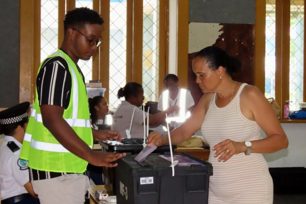 A woman casts her vote at Bel Eau Primary School, Bel Air, Seychelles, on Saturday, Sep. 27, 2025. (AP Photo/Emilie Chetty)
