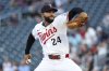 CORRECTS TO TWINS PITCHER SIMEON WOODS RICHARDSON NOT YANKEES PITCHER CARLOS RODON - Minnesota Twins pitcher Simeon Woods Richardson delivers against the New York Yankees during the first inning of baseball game Monday, Sept. 15, 2025, in Minneapolis. (AP Photo/Matt Krohn) Simeon Woods Richardson