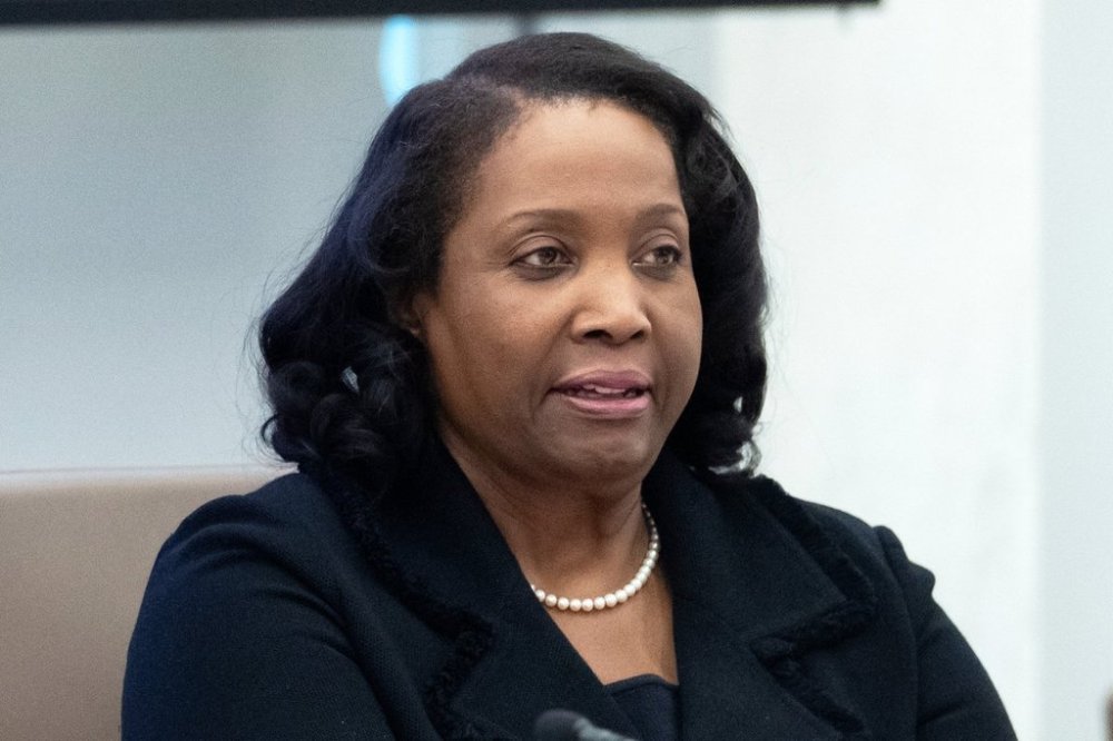FILE - Federal Reserve Board of Governors member Lisa Cook listens during an open meeting of the Board of Governors, June 25, 2025, in Washington. (AP Photo/Mark Schiefelbein, File)