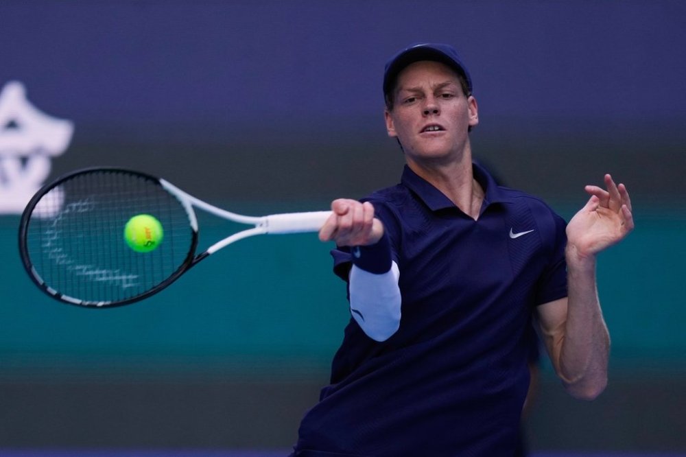 Jannik Sinner of Italy returns a forehand shot to Fabian Marozsan, of Hungary during a men's singles match of the China Open tennis tournament, at the National Tennis Center, in Beijing, China, Monday, Sept. 29, 2025. (AP Photo/Mahesh Kumar A.)