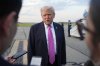 President Donald Trump speaks with reporters before boarding Air Force One at Morristown Airport, Sunday, Sept. 14, 2025, in Morristown, N.J. (AP Photo/Alex Brandon)