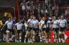 Canada's team players celebrate after scoring their first try during the Women's Rugby World Cup 2025 semifinal match between New Zealand and Canada in Bristol, England, Friday, Sept. 19, 2025. (AP Photo/Anthony Upton)
