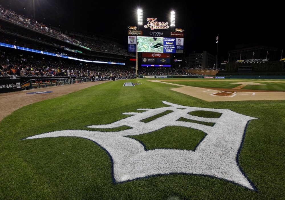 FILE - The Detroit Tigers logo is seen during a rain delay at Game 4 of the American League championship series against the New York Yankees Wednesday, Oct. 17, 2012, in Detroit. (AP Photo/Paul Sancya, File)