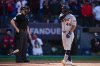 Detroit Tigers' Wenceel Pérez flips his bat after striking out, as home plate umpire Adam Beck is left, in the seventh inning of Game 2 of the American League Wild Card baseball playoff series against the Cleveland Guardians in Cleveland, Wednesday, Oct. 1, 2025. (AP Photo/Sue Ogrocki)