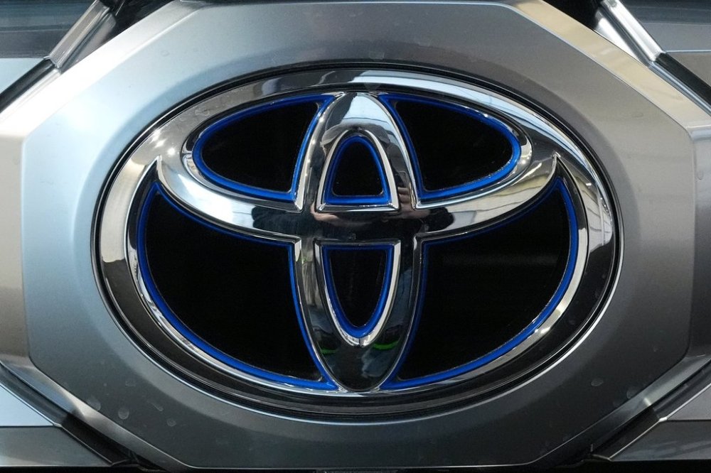 FILE - A Toyota logo is seen on a Toyota Tundra HV 4x4 at the Pittsburgh International Auto Show in Pittsburgh, Feb. 15, 2024. (AP Photo/Gene J. Puskar, File)