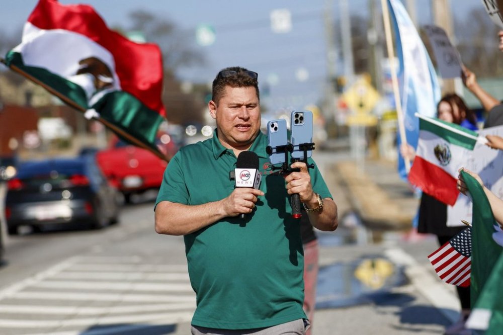 FILE - Mario Guevara, the metro Atlanta-based Spanish-language reporter, covers a protest against immigration enforcement on Buford Highway in Georgia, on Saturday, Feb. 1, 2025. (Miguel Martinez/Atlanta Journal-Constitution via AP, File)