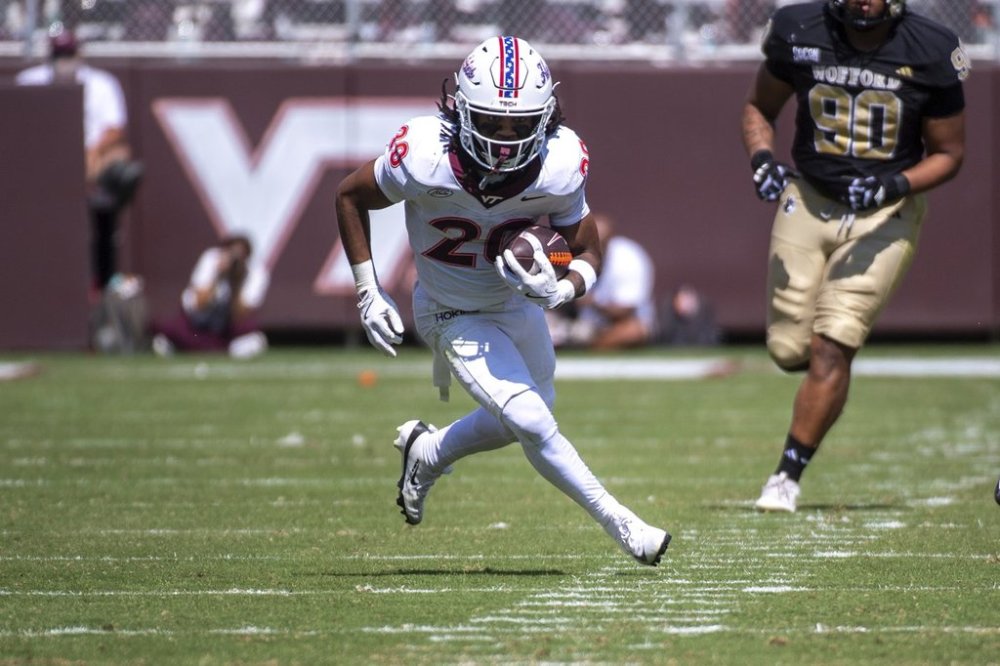 Virginia Tech running back P.J. Prioleau (20) carries the ball against Wofford during the first half of an NCAA college football game Saturday, Sept. 20 2025, in Blacksburg, Va. (AP Photo/Robert Simmons)