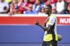 Dortmund's Serhou Guirassy reacts after scoring the opening goal during the German Bundesliga soccer match between 1. FC Heidenheim and Borussia Dortmund in Heidenheim, Germany, Saturday, Sept. 13, 2025. (Harry Langer/dpa via AP)
