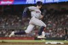 Houston Astros' Zach Cole rounds third base in the fifth inning of a baseball game against the Atlanta Braves, Friday, Sept. 12, 2025, in Atlanta. (AP Photo/Colin Hubbard)