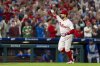 Philadelphia Phillies' Kyle Schwarber reacts to his three-run home run during the seventh inning of a baseball game against the New York Mets, Tuesday, Sep. 9, 2025, in Philadelphia. (AP Photo/Chris Szagola)