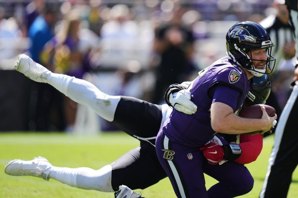 during the first half of an NFL football game, Sunday, Oct. 5, 2025, in Baltimore. (AP Photo/Stephanie Scarbrough)
