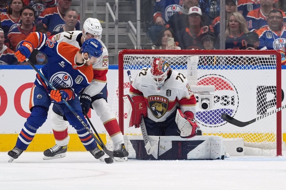 Florida Panthers goalie Sergei Bobrovsky (72) stops Edmonton Oilers right wing Vasily Podkolzin (92) during first period of game five NHL Stanley Cup hockey finals in Edmonton, Saturday, June 14, 2025. THE CANADIAN PRESS/Darryl Dyck