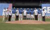 Former and current Blue Jay pitchers Mike Timlin, left to right, Tom Henke, Duane Ward, J.A. Happ, Pat Hentgen, Brett Cecil, Dave Stieb, R.A. Dickey, Marco Estrada, Roy Halladay, Aaron Sanchez and Juan Guzman pose for a photo as part of pre-game ceremonies celebrating the team's 40th anniversary season, prior to the start of the Blue Jays American League MLB baseball game against the Houston Astros in Toronto on Sunday, August 14, 2016. THE CANADIAN PRESS/Fred Thornhill