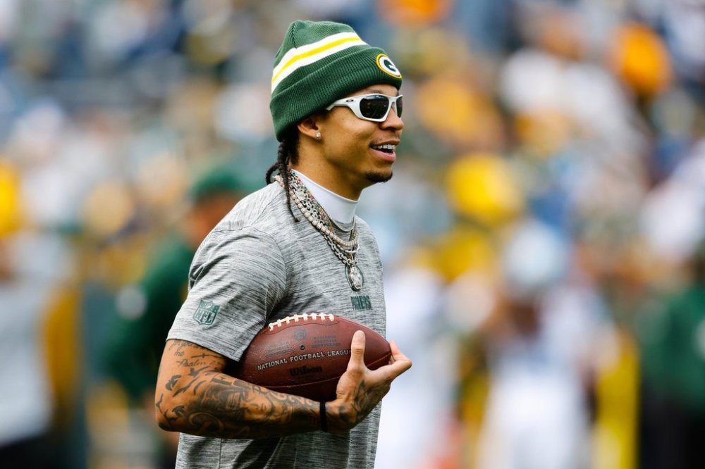 FILE - Green Bay Packers' Christian Watson walks on the field before a NFL football game against the Detroit Lions, Sunday, Sept. 7, 2025, in Green Bay, Wis. (AP Photo/Jeffrey Phelps, File)