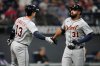 Detroit Tigers' Riley Greene (31) is congratulated by Dillon Dingler (13) after hitting a home run in the fourth inning of a baseball game against the Cleveland Guardians in Cleveland, Thursday, Sept. 25, 2025. (AP Photo/Sue Ogrocki)