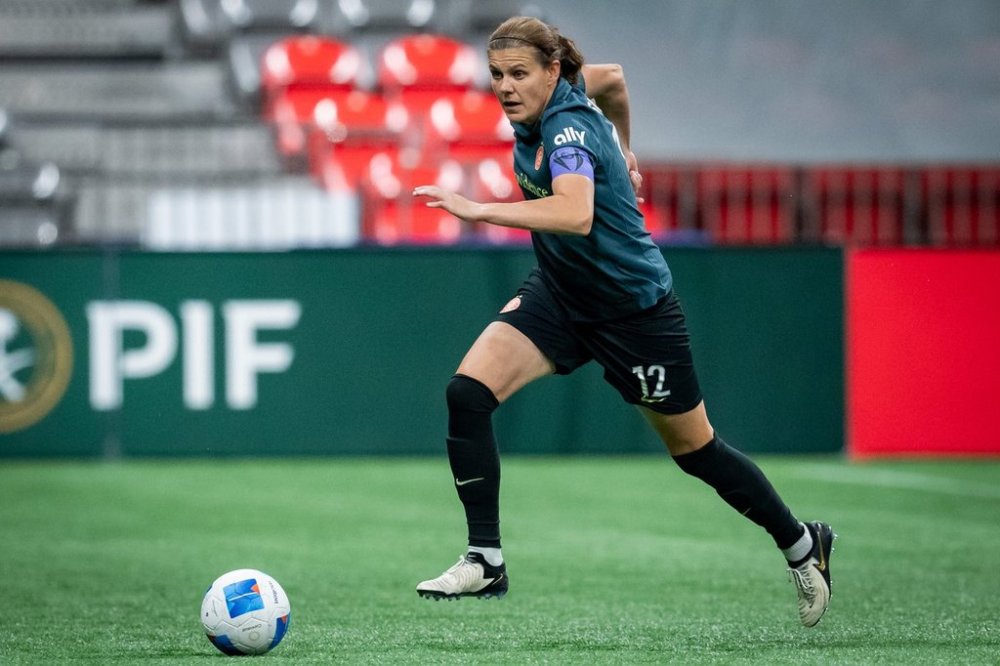 Portland Thorns FC's Christine Sinclair vies for the ball during the first half of a CONCACAF W Champions Cup match against the Vancouver Whitecaps in Vancouver, on Tuesday, October 15, 2024. THE CANADIAN PRESS/Ethan Cairns