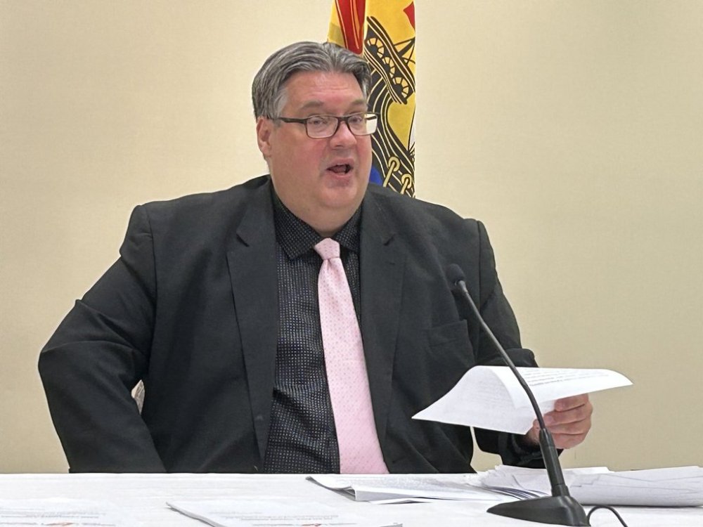 New Brunswick's child and youth and seniors advocate Kelly Lamrock attends a news conference in Fredericton on Tuesday, Aug. 15, 2023. THE CANADIAN PRESS/Hina Alam