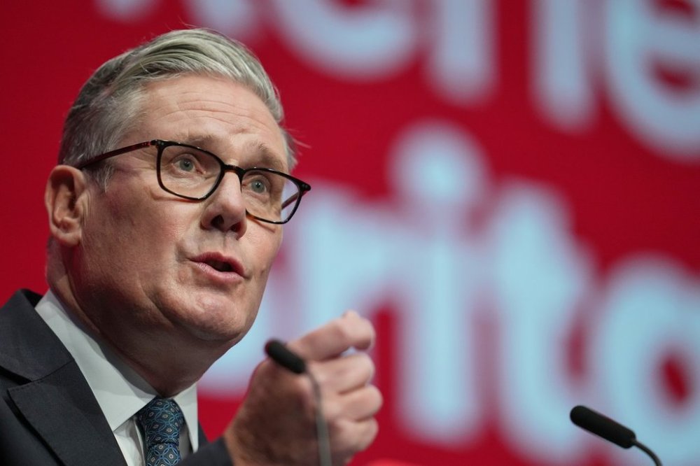 Britain's Prime Minister Keir Starmer gestures as he gives his keynote speech at the annual Labour Party conference in Liverpool, England, Tuesday, Sept. 30, 2025. (AP Photo/Jon Super)