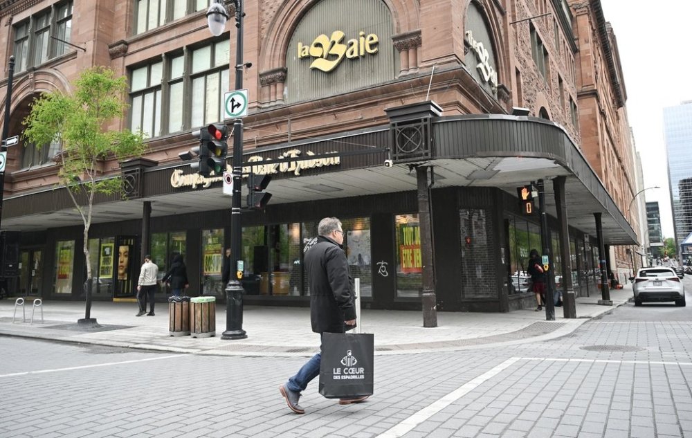 A person walks by a Hudson’s Bay store in Montreal, Sunday, June 1, 2025. THE CANADIAN PRESS/Graham Hughes