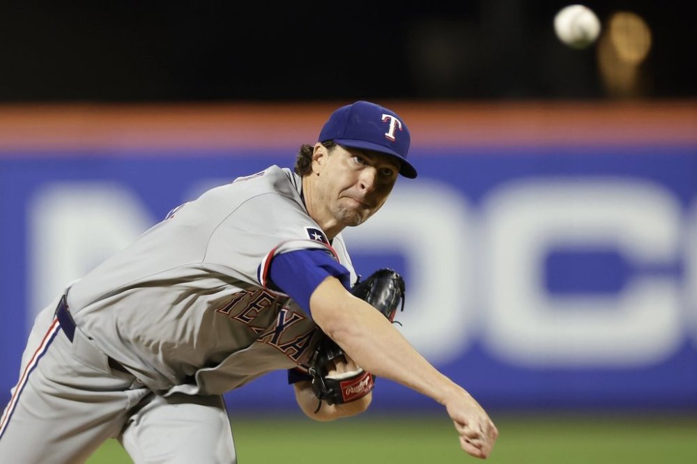 Texas Rangers pitcher Jacob deGrom throws during the second inning of a baseball game against the New York Mets, Friday, Sept. 12, 2025, in New York. (AP Photo/Adam Hunger)