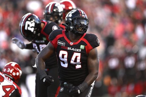Ottawa Redblacks defensive end Lorenzo Mauldin IV (94) reacts after a tackle during first-half CFL football action against the Calgary Stampeders in Ottawa on Friday, Aug. 5, 2022. The CFL’s top defensive player last season was slated to become a free agent next month. But Mauldin IV signed a one-year contract extension to remain with the Redblacks. THE CANADIAN PRESS/Justin Tang