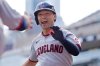 Cleveland Guardians' Steven Kwan celebrates after his leadoff home run against the Minnesota Twins in the first inning of a baseball game Sunday, Sept. 21, 2025, in Minneapolis. (AP Photo/Bruce Kluckhohn)