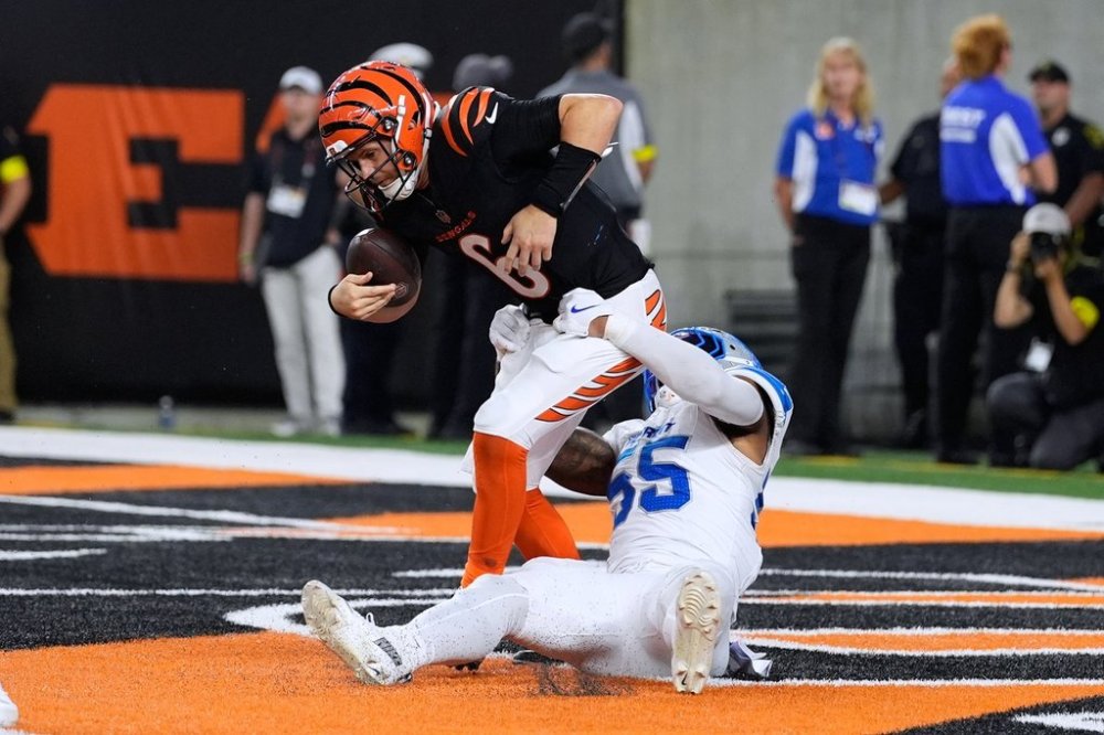 Detroit Lions linebacker Derrick Barnes (55) sacks Cincinnati Bengals quarterback Jake Browning (6) for a safety during the second half of an NFL football game Sunday, Oct. 5, 2025, in Cincinnati. (AP Photo/Carolyn Kaster)
